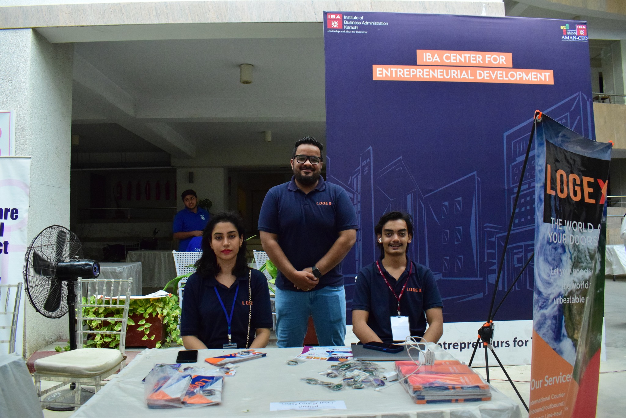 Startup team showcasing logistics services at an I-Bazaar booth